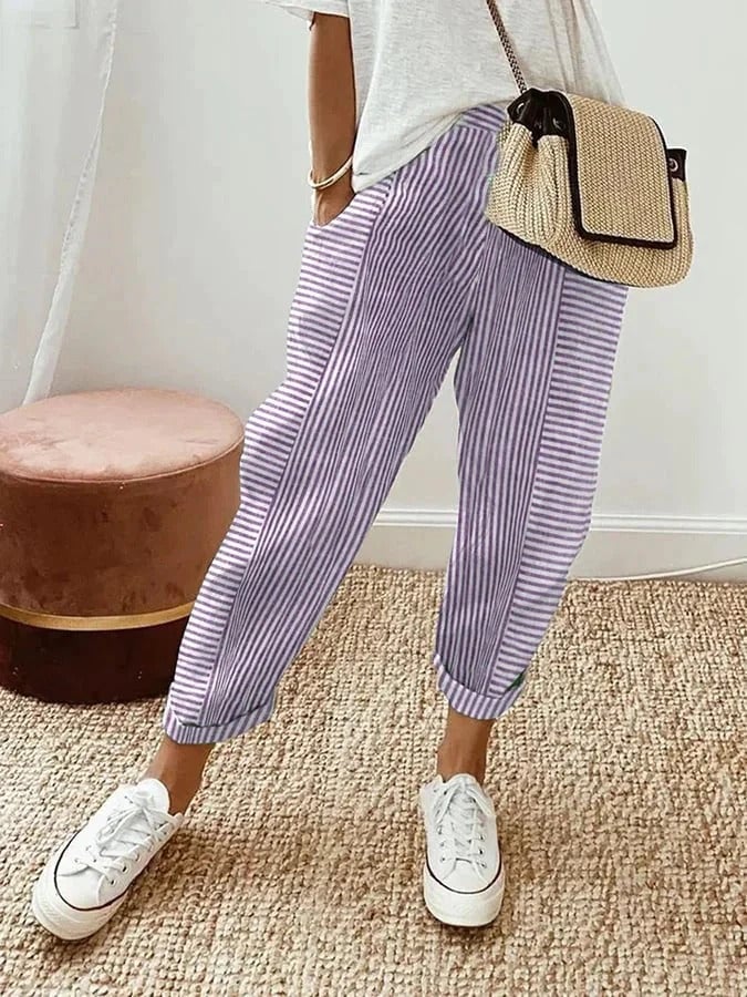 Flat lay of striped pants showing fabric texture and color options