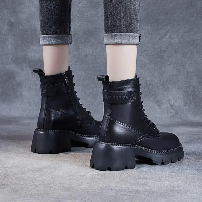 Front view of Holly orthopedic boots in black with a sleek streamlined silhouette