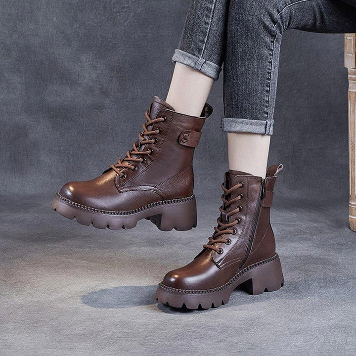 Holly orthopedic boots in brown paired with a midi skirt for a polished everyday look