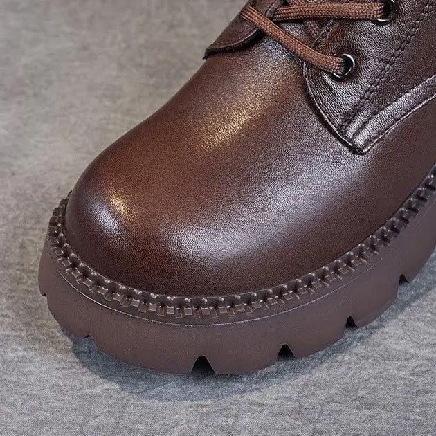 Holly orthopedic boots in black and brown displayed side by side for color comparison