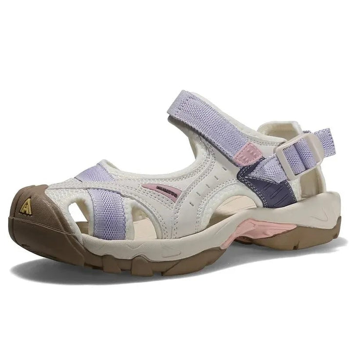 Close-up of Holly sandal adjustable strap and contoured outsole detail