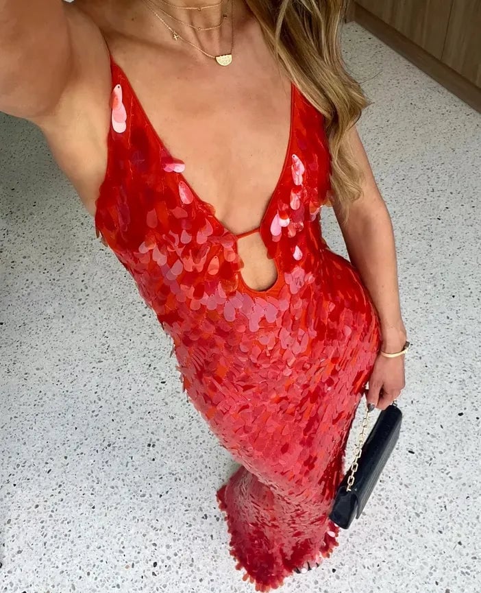 Back view of the Holly red sequin dress showing the elegant open-back design