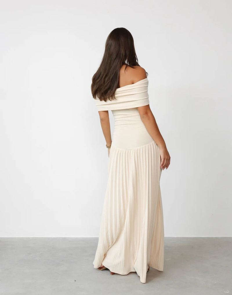 Close-up of a navy flowy maxi dress showing lightweight breathable fabric texture and smooth relaxed fit