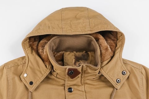 Lifestyle image of the Hudson Military Elegant Coat in black worn in an urban outdoor setting