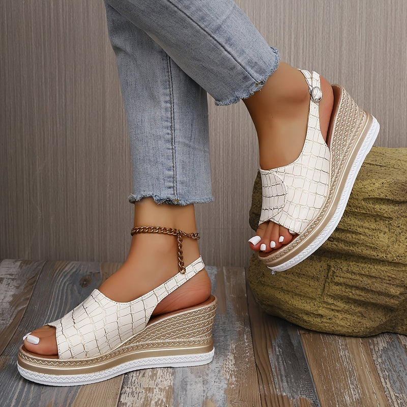 Close-up of the plush insole and elegant strap detail on the Imara white wedge sandals
