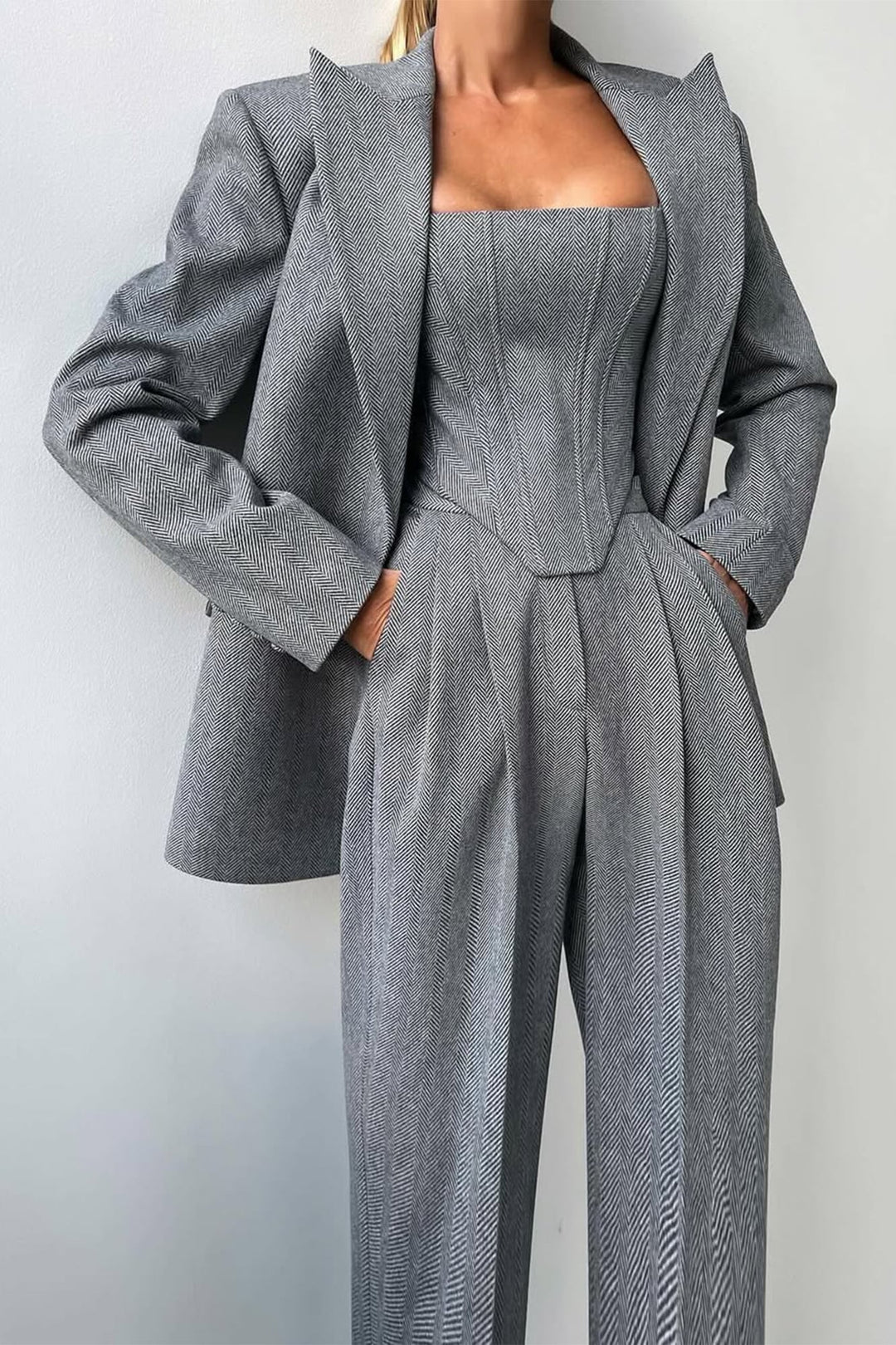 Front view of the Imogen herringbone three-piece suit set in gray, showing structured blazer, top, and tailored pants