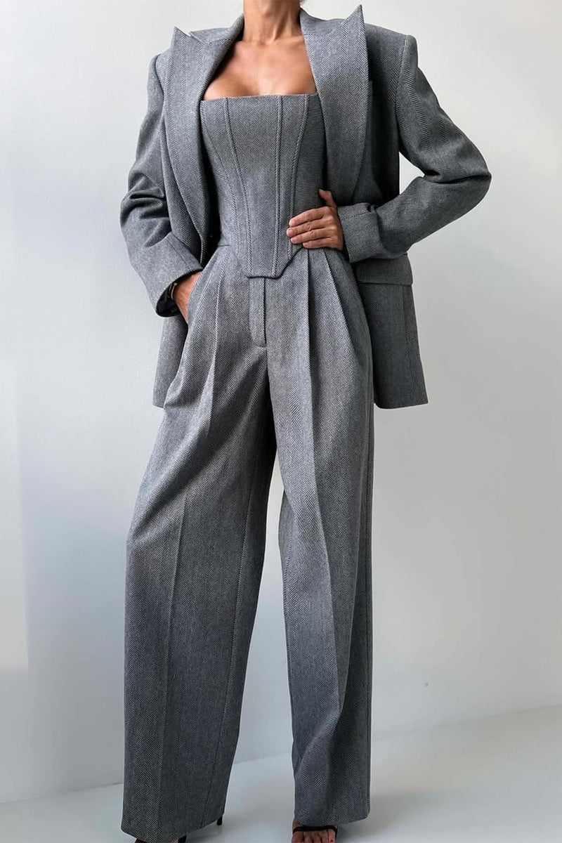 Close-up of herringbone texture detail on the Imogen suit set blazer in gray