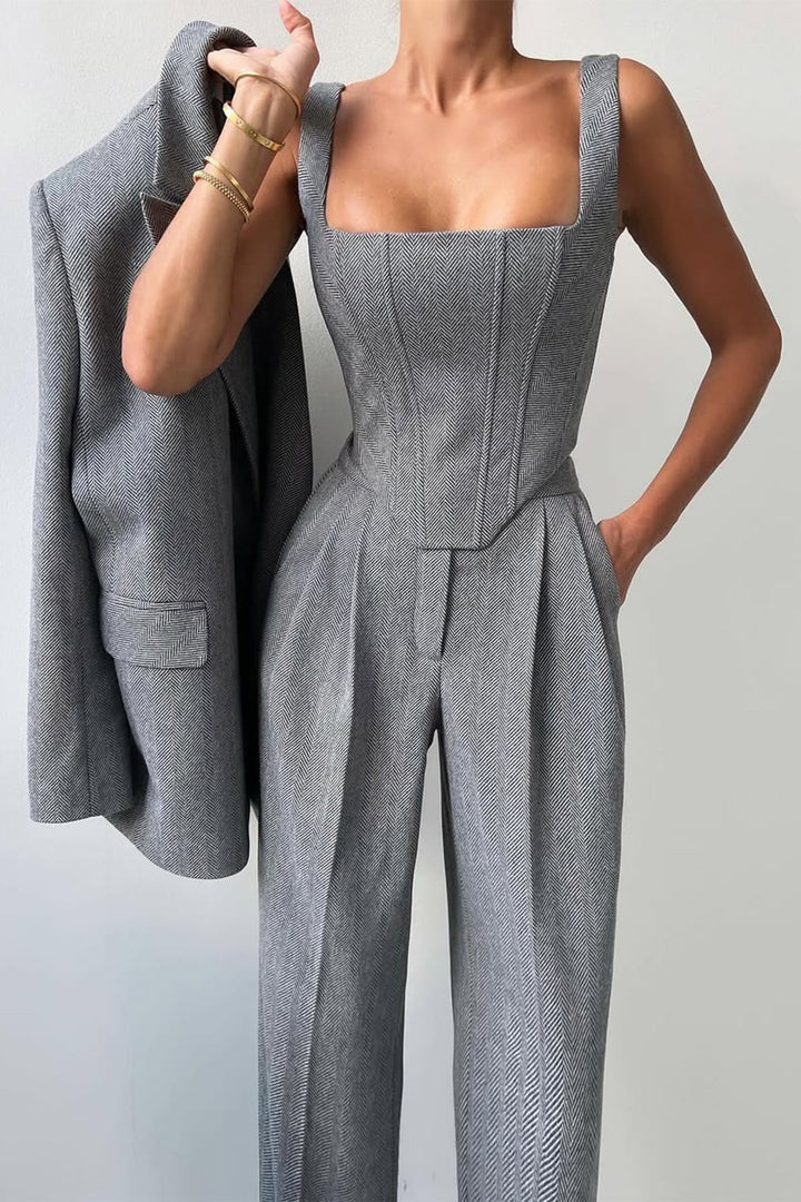 Side profile view of the Imogen gray herringbone blazer and pants ensemble