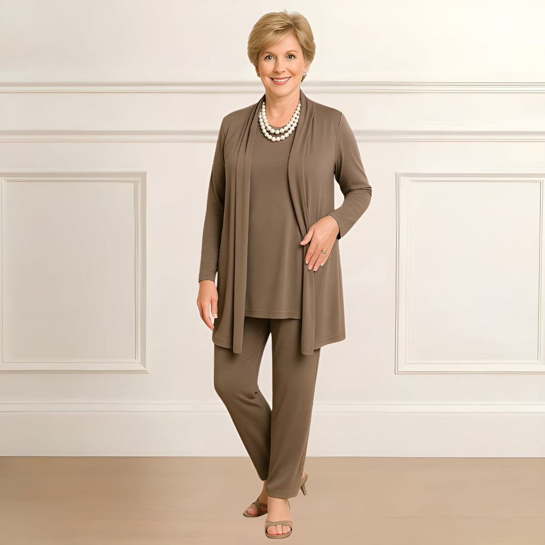 Woman wearing the Ingrid coordinated cardigan top and pants set in taupe brown, showing full-length relaxed pants and open-front cardigan