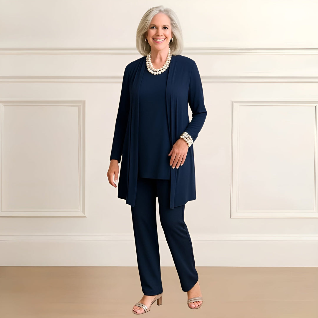 Side profile of the Ingrid cardigan set highlighting the elongating full-length pants silhouette
