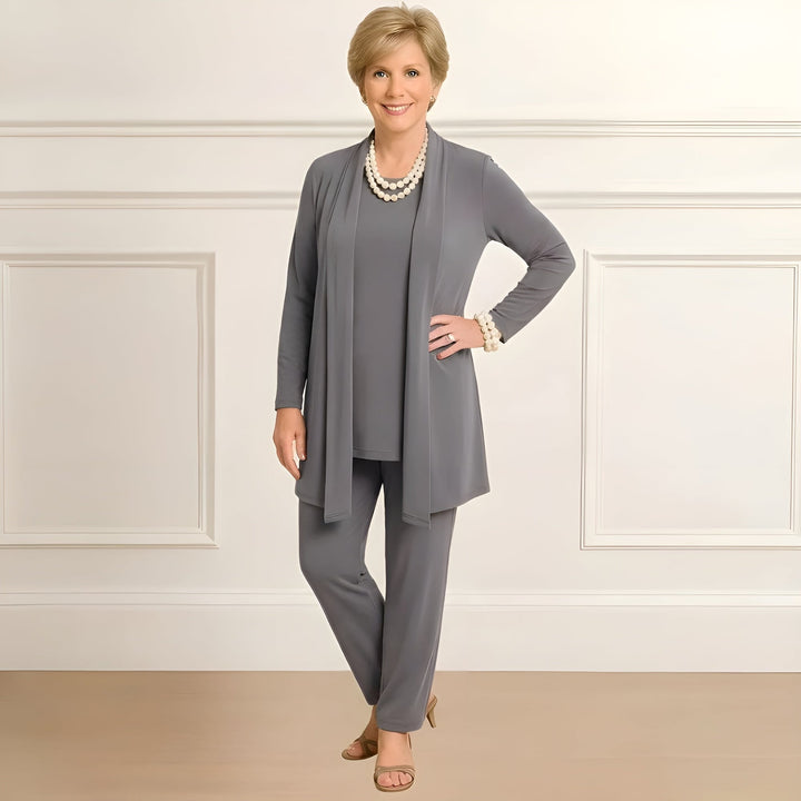 Ingrid cardigan top and pants set laid flat showing all three pieces in dark grey