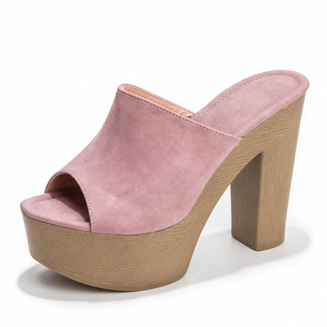 Ingrid platform sandals in brown styled with wide-leg linen trousers