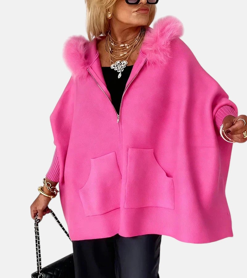 Woman wearing the Irene casual hooded coat in a relaxed silhouette with a cozy hood, front view