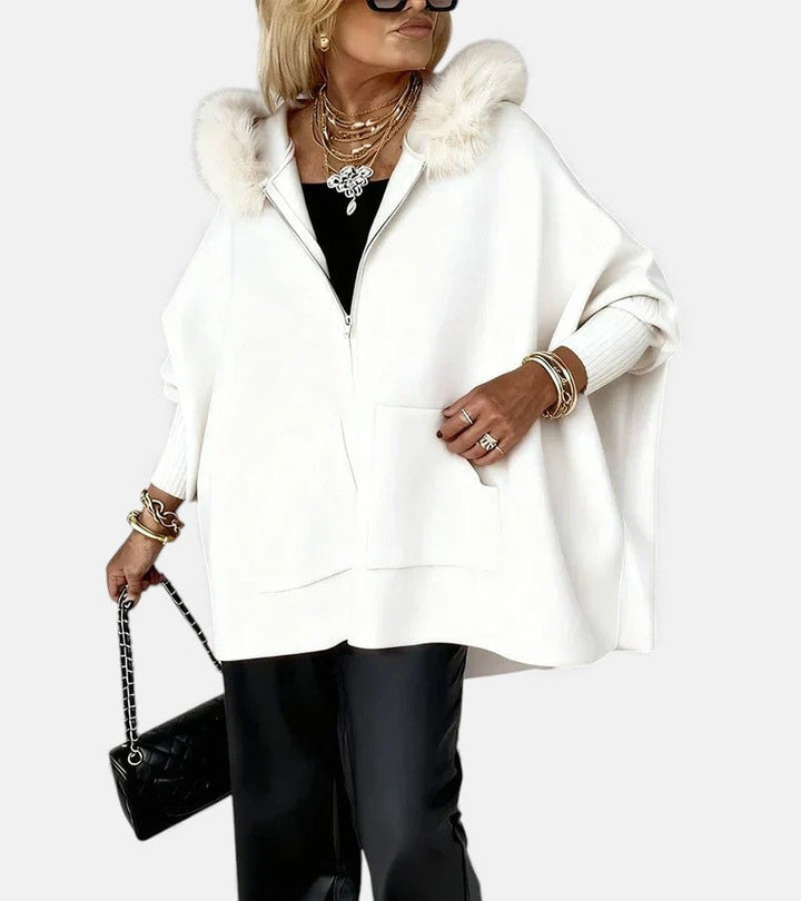 Model wearing the Irene hooded coat in an alternate color option, front view