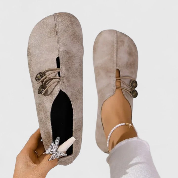 Side profile of Irene elegant loafers in light brown showing cushioned insole and refined detailing