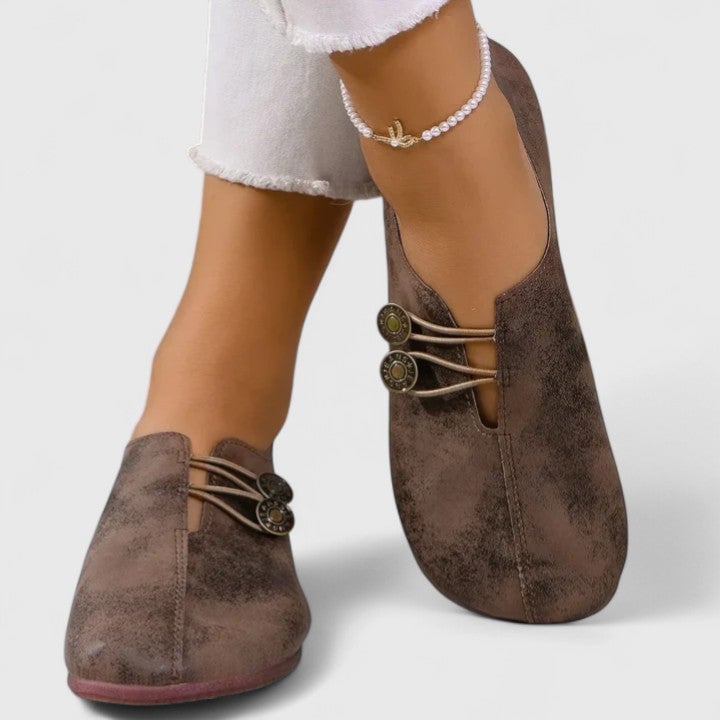 Irene elegant loafers in light brown paired with a midi skirt for a chic casual outfit