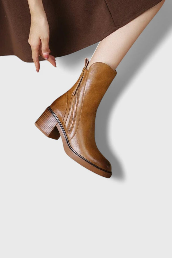 Irina ankle boots in brown styled with tailored trousers, side view