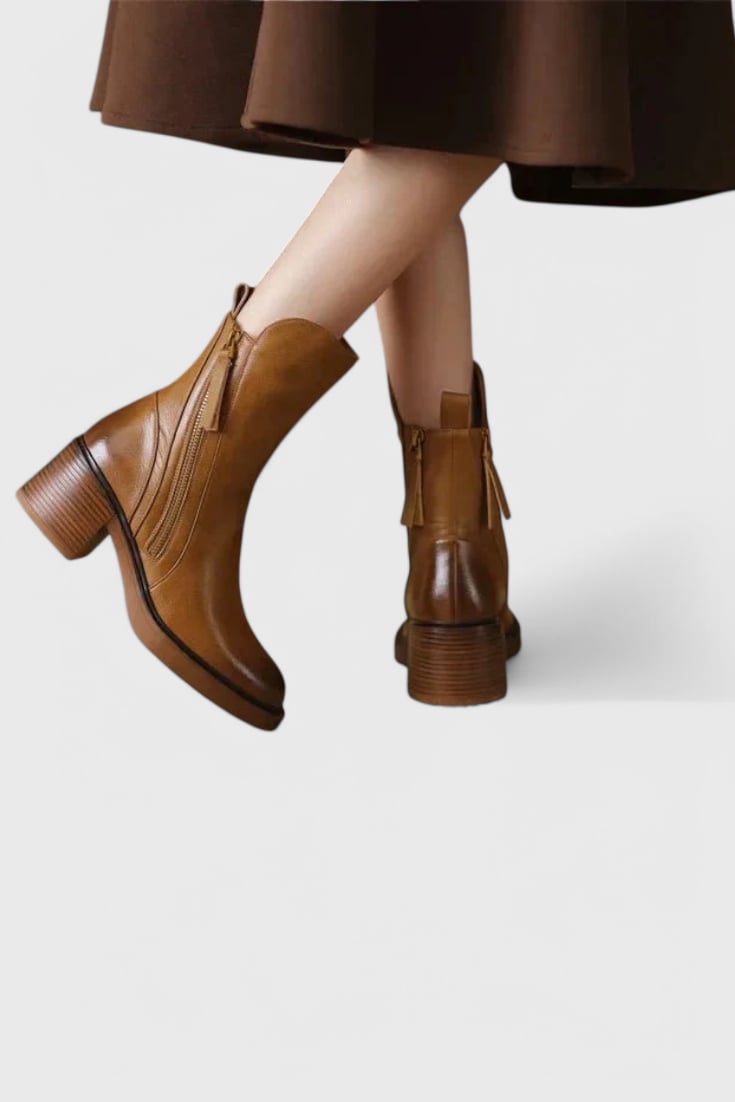 Irina ankle boots in black and brown colorways shown together for color comparison