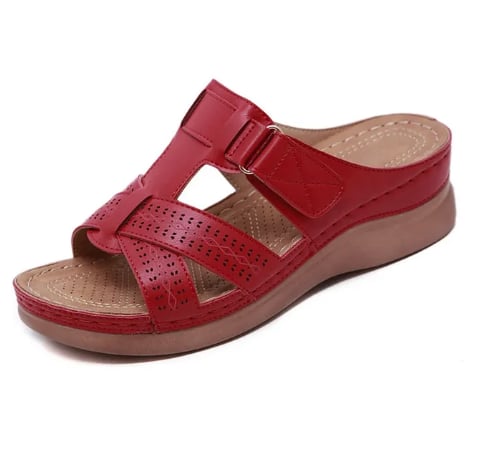 Pair of Irina women's sandals in black shown from the back, heel and sole detail