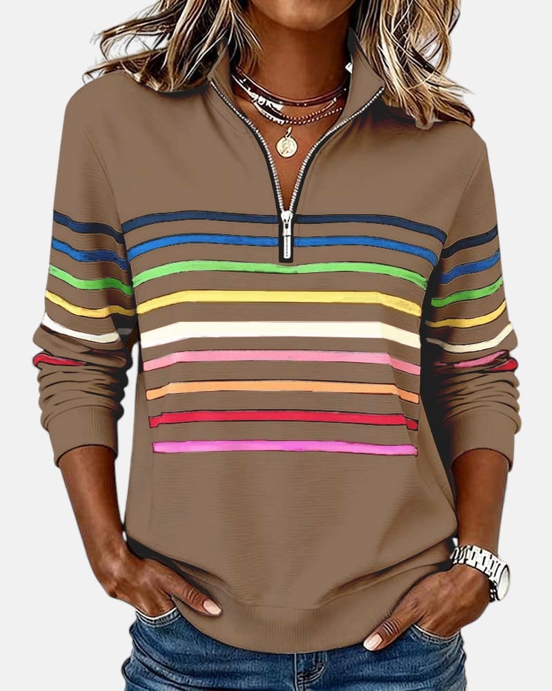 Side view of relaxed-fit rainbow striped zip sweatshirt showing length and smooth silhouette