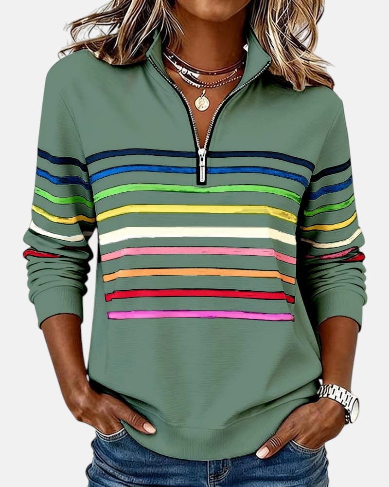 White rainbow striped zip sweatshirt laid flat showing full front design