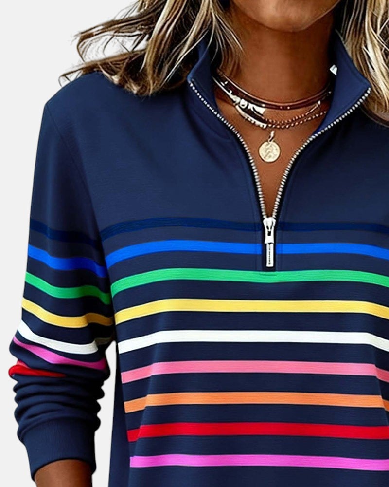 Green rainbow striped zip sweatshirt front view on a standing model