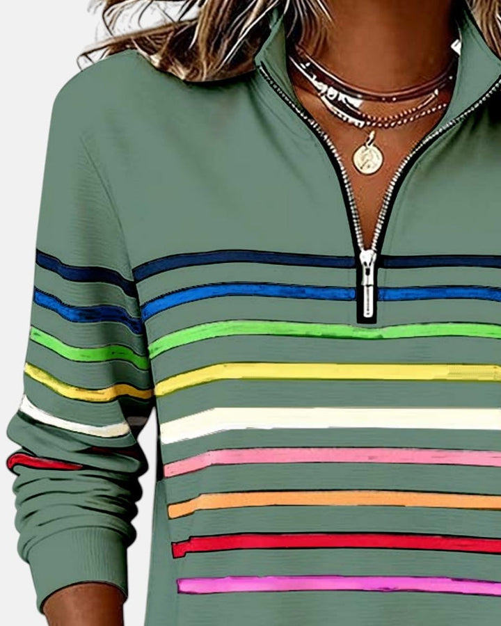 Overhead flat lay of rainbow striped zip sweatshirt in multiple color options