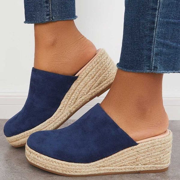 Iris women's sandals in blue with clean strap detailing and a cushioned footbed, shown on a neutral background