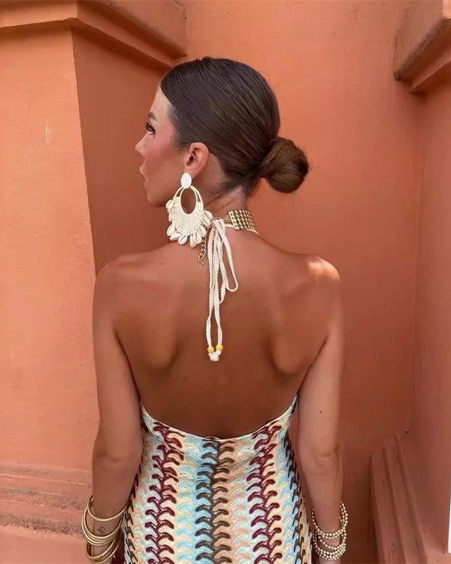 Side view of the Iris women's crochet draped dress showing the relaxed silhouette