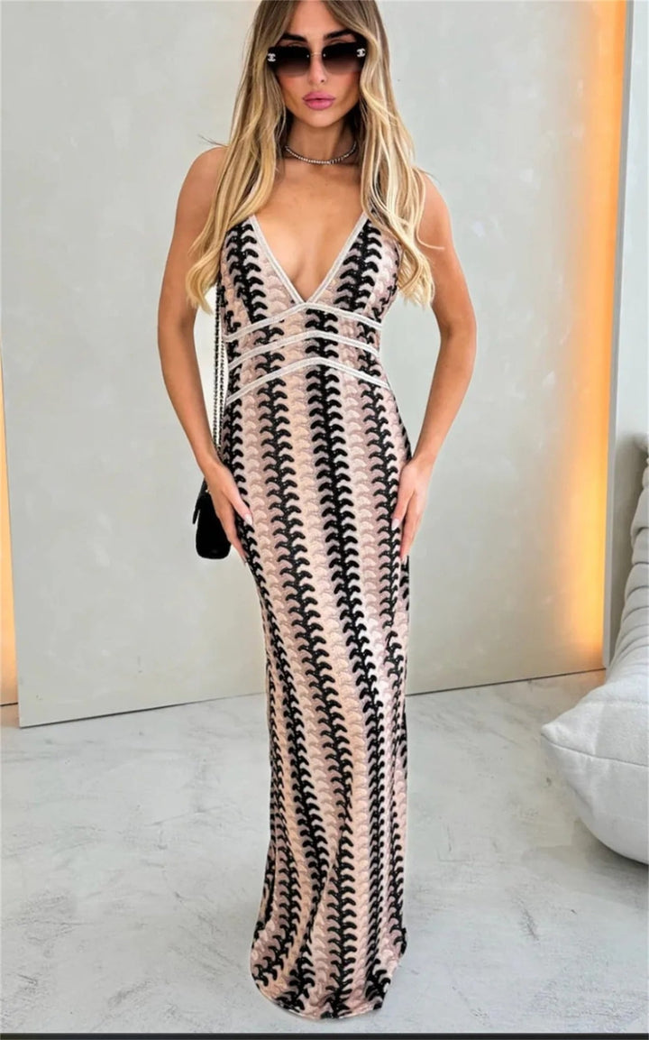 Full-length shot of the Iris crochet beach dress in natural sunlight