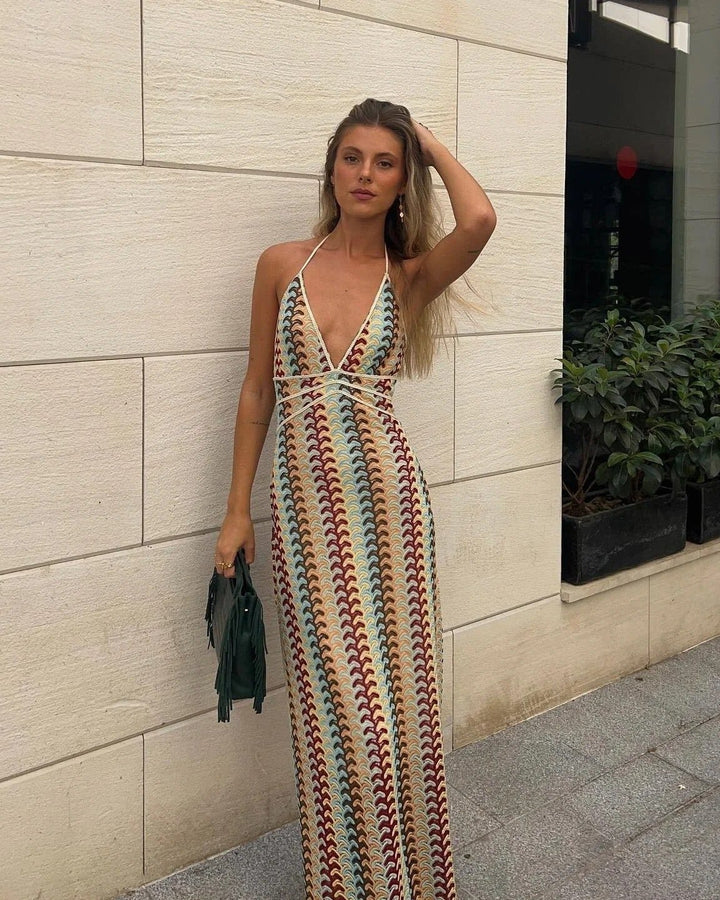 Lifestyle shot of the Iris women's crochet dress styled with woven accessories