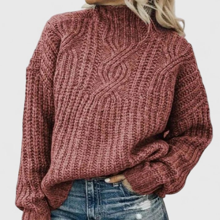 Front view of the Isabel sophisticated sweater styled with tailored pants, showcasing the clean and polished everyday look