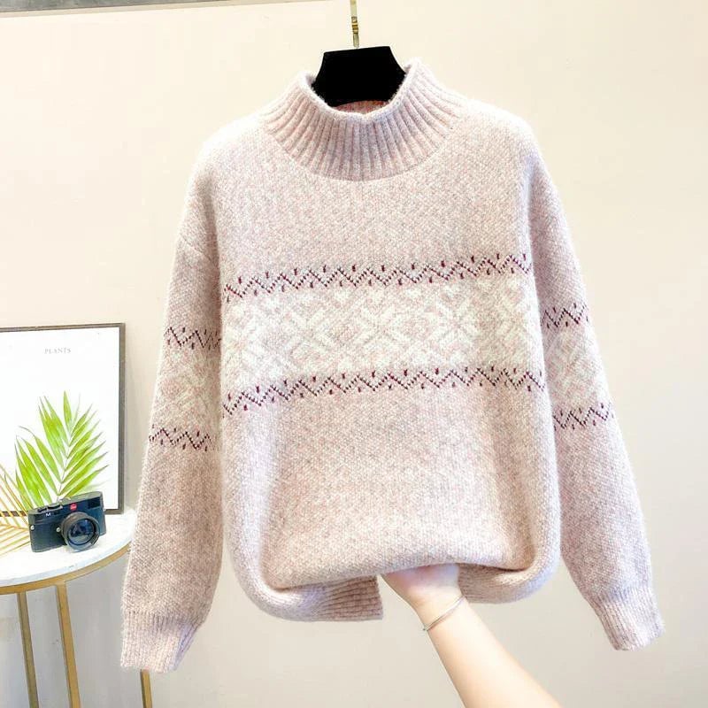 Close-up of intricate snowflake knit pattern on a cozy winter sweater