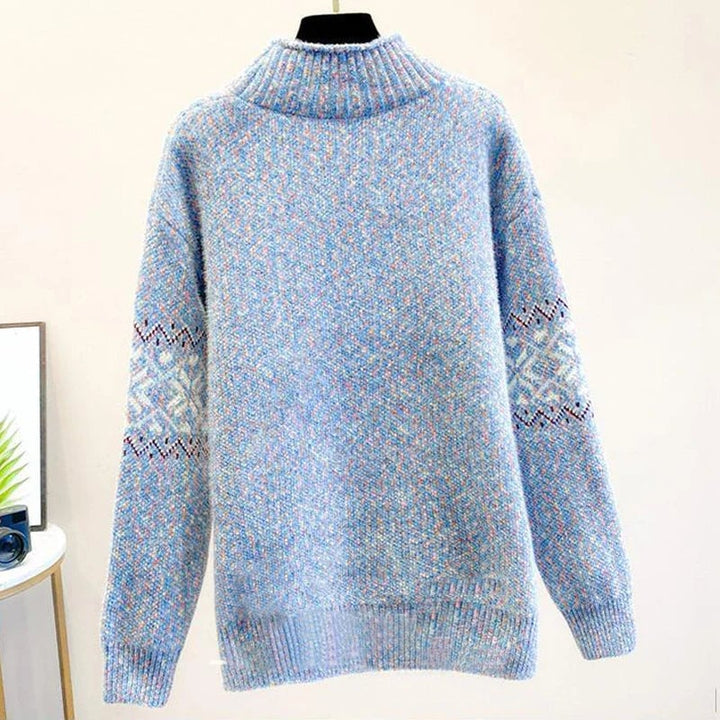 Gray snowflake knit sweater styled with a casual winter outfit