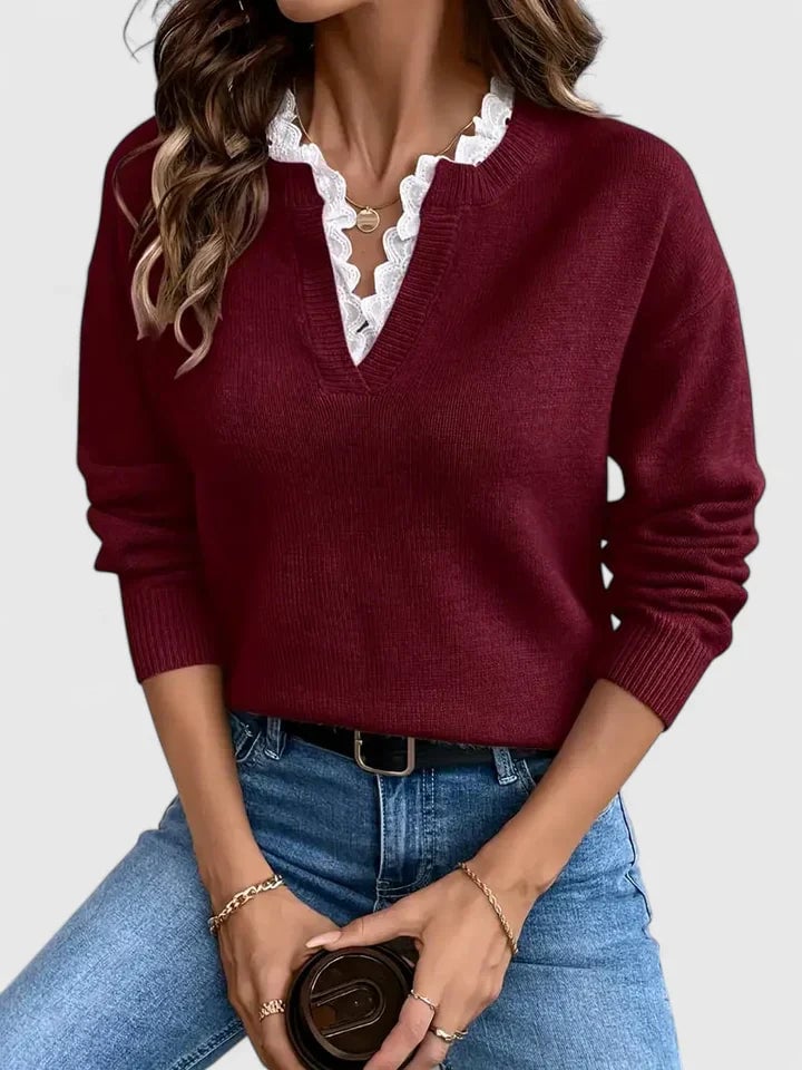 Model wearing the Isabella elegant sweater styled with tailored trousers for a polished everyday look