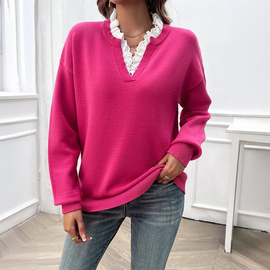 Isabella elegant sweater in Dark Blue colorway displayed on a model in a casual chic outfit