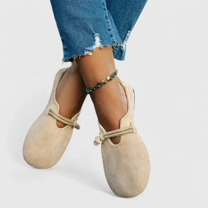 Isabella orthopedic loafers in beige styled with tailored trousers on a model
