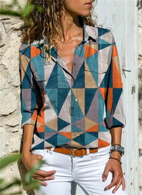 Side view of the Isabelle long sleeve blouse showing relaxed silhouette and rolled-up sleeve option
