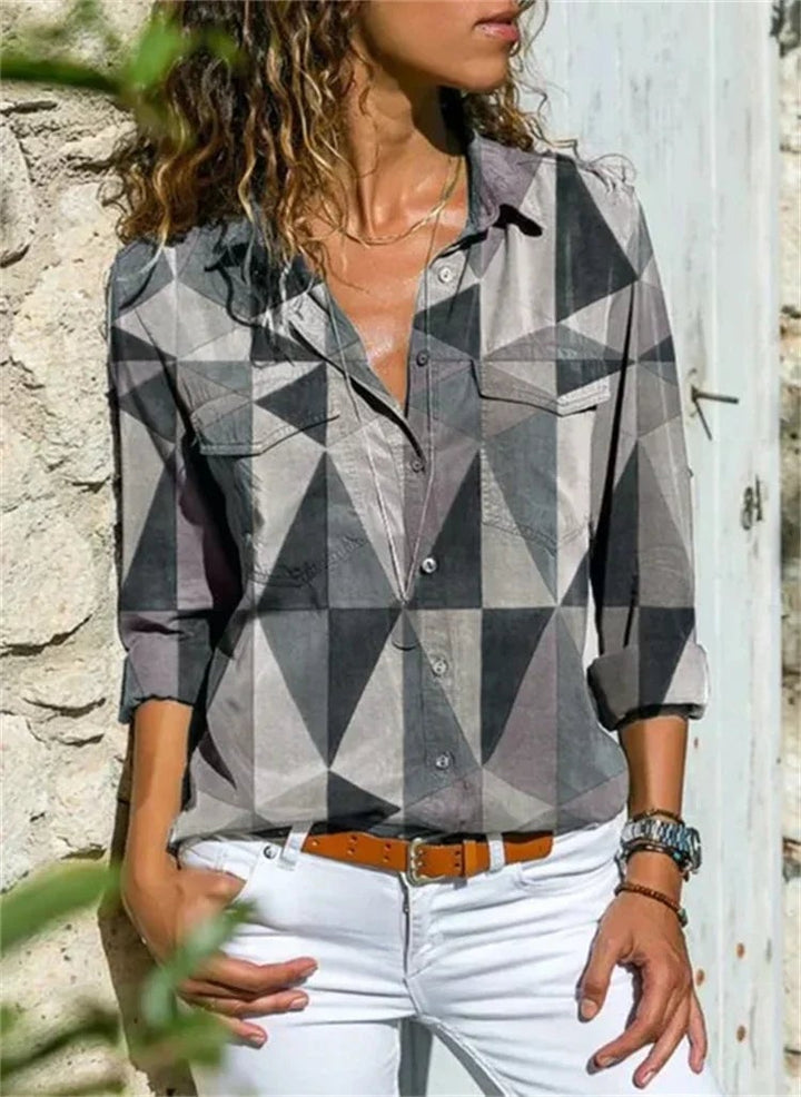Isabelle blouse styled tucked into white pants for a polished smart-casual look