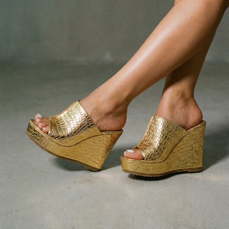 Side view of Isadora gold open-toe platform wedge sandals