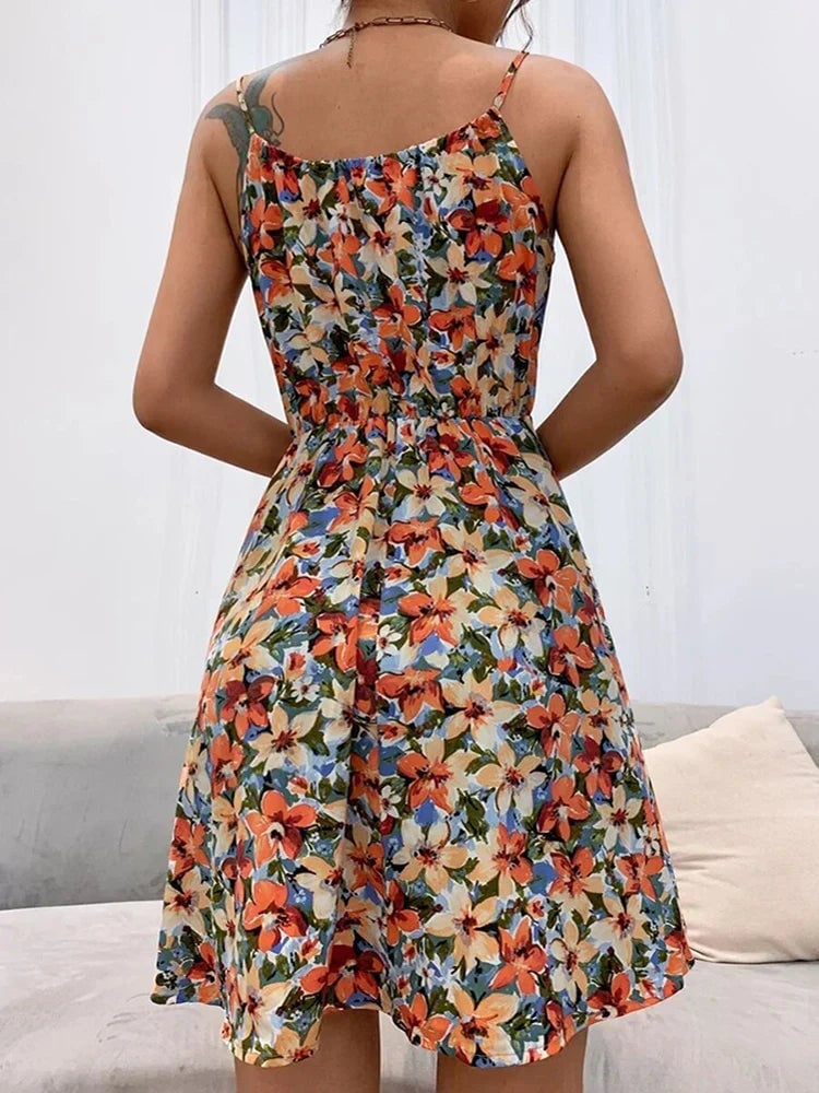 Close-up of lace-up halter neckline detail on a floral summer dress in pink