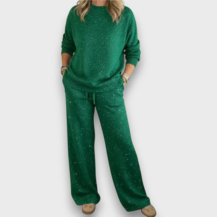 Woman wearing the Isla relaxed two-piece lounge set in a flowing top and matching bottoms, front view