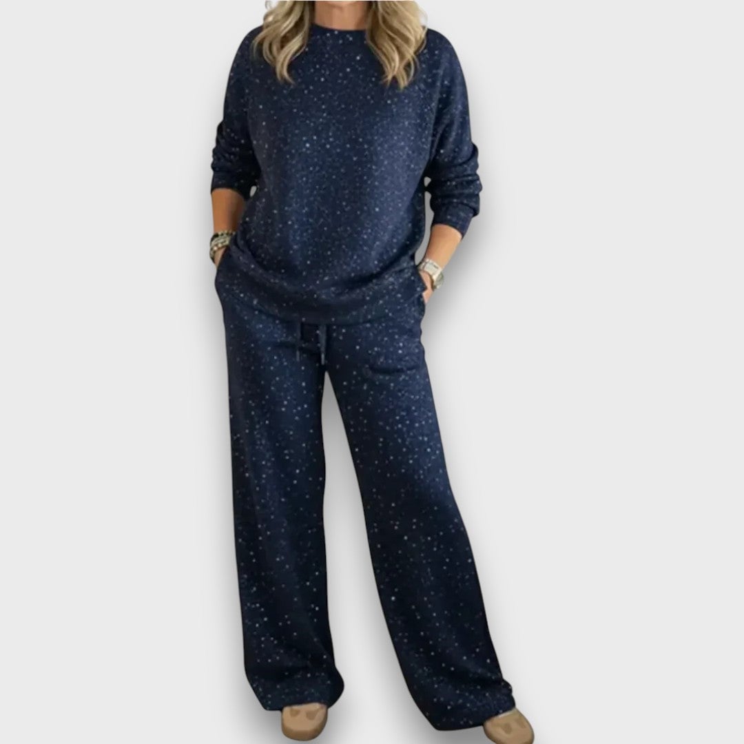 Model wearing the Isla two-piece lounge set showing coverage through the arms and waist