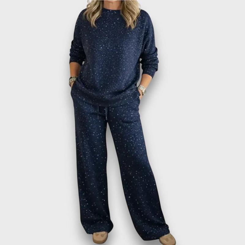 Model wearing the Isla two-piece lounge set showing coverage through the arms and waist