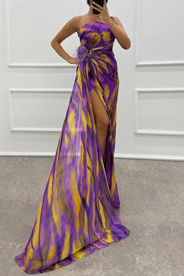 Side profile of model wearing Isla maxi dress in red, highlighting flowing cut