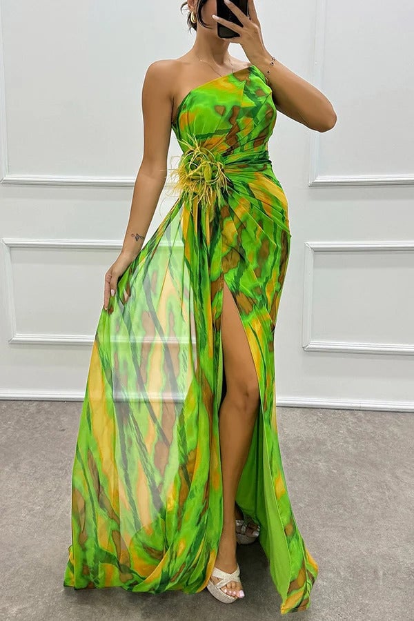 Model wearing Isla maxi dress in green, showcasing flattering silhouette