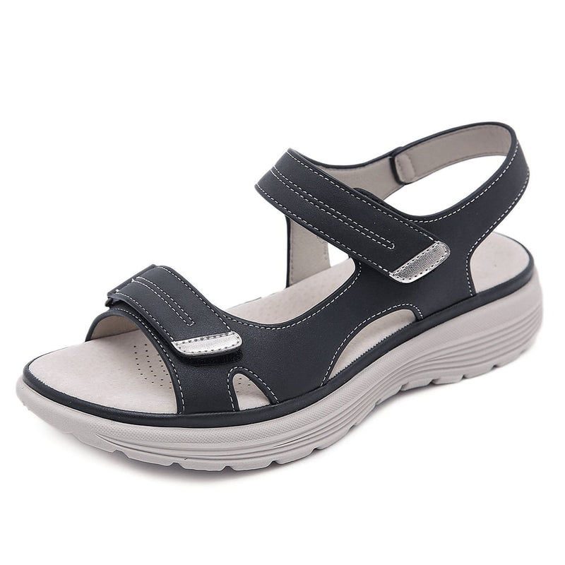 Side profile of Isolde orthopedic sandal highlighting adjustable straps and supportive sole in gray