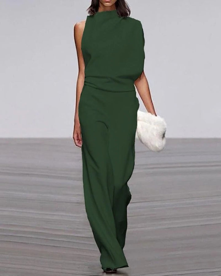 Ivory wide-leg jumpsuit showing floor-length tailored pants and fitted waist, three-quarter view