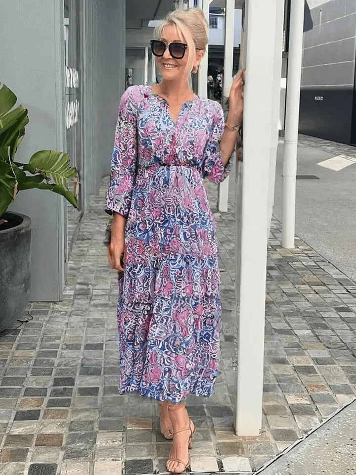 Close-up of floral print detail on a soft, breathable boho midi dress in pink