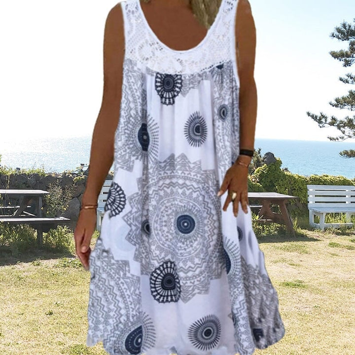 Woman wearing a lightweight sleeveless summer dress in white, front view